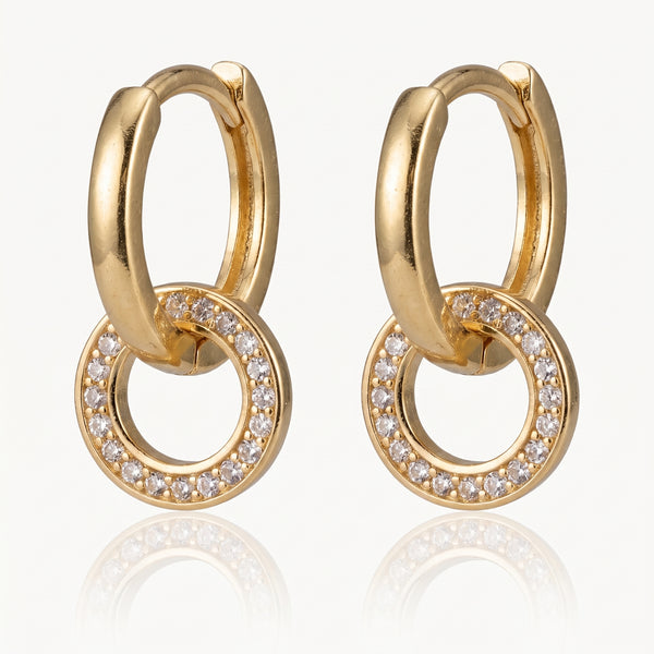 Gold-tone interlocking hoop earrings with a crystal-set ring