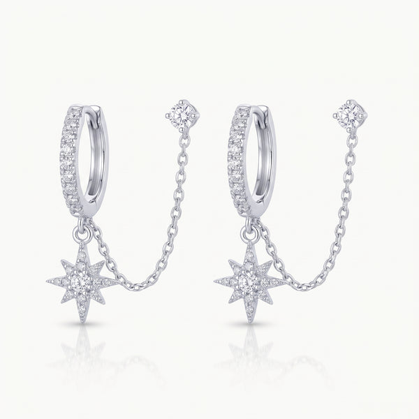 Silver-tone chained huggie earrings with star charm and crystal stud