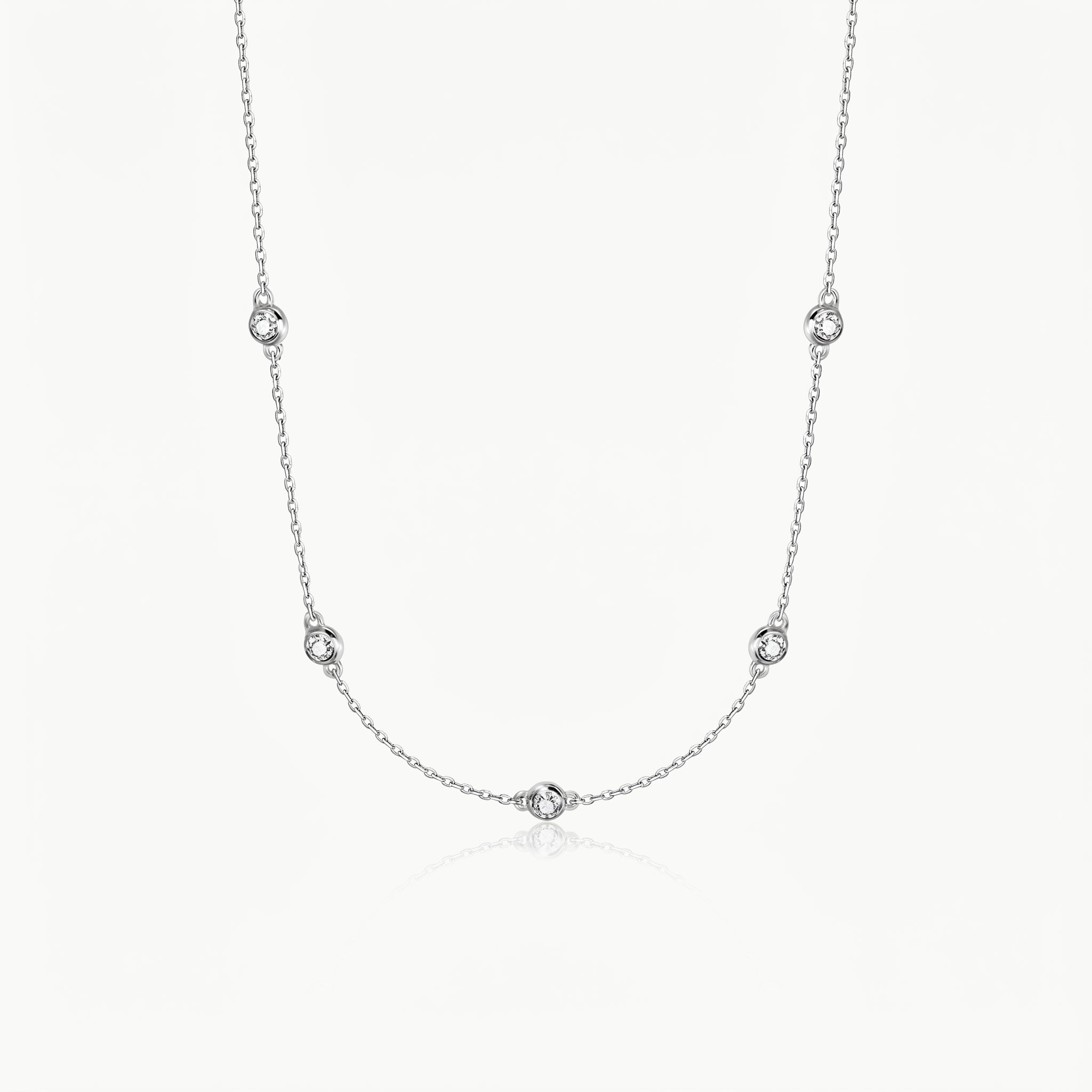 Silver-tone crystal necklace with five stones on a fine chain
