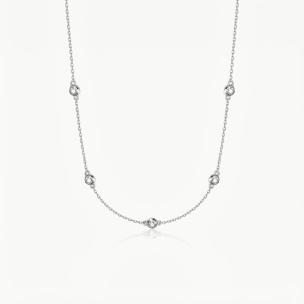 Silver-tone crystal necklace with five stones on a fine chain