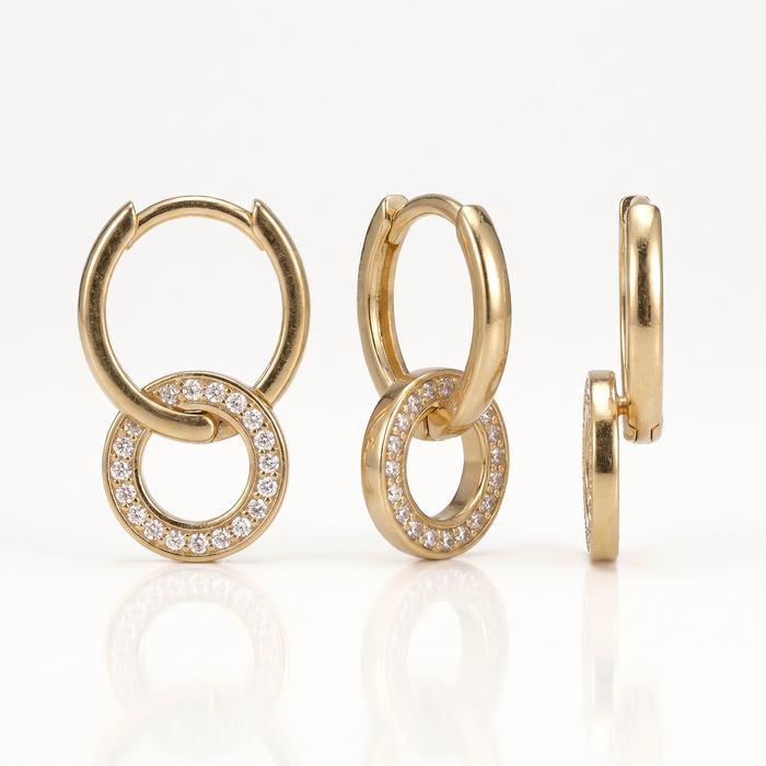 Gold-tone interlocking hoop earring shown from the front, at an angle and from the side