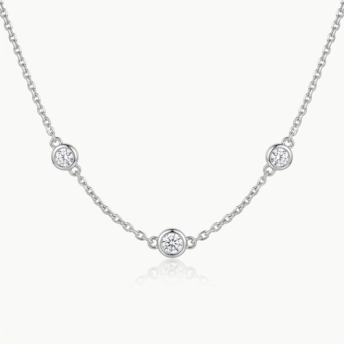 Three crystals on the silver-tone chain, seen at an angle