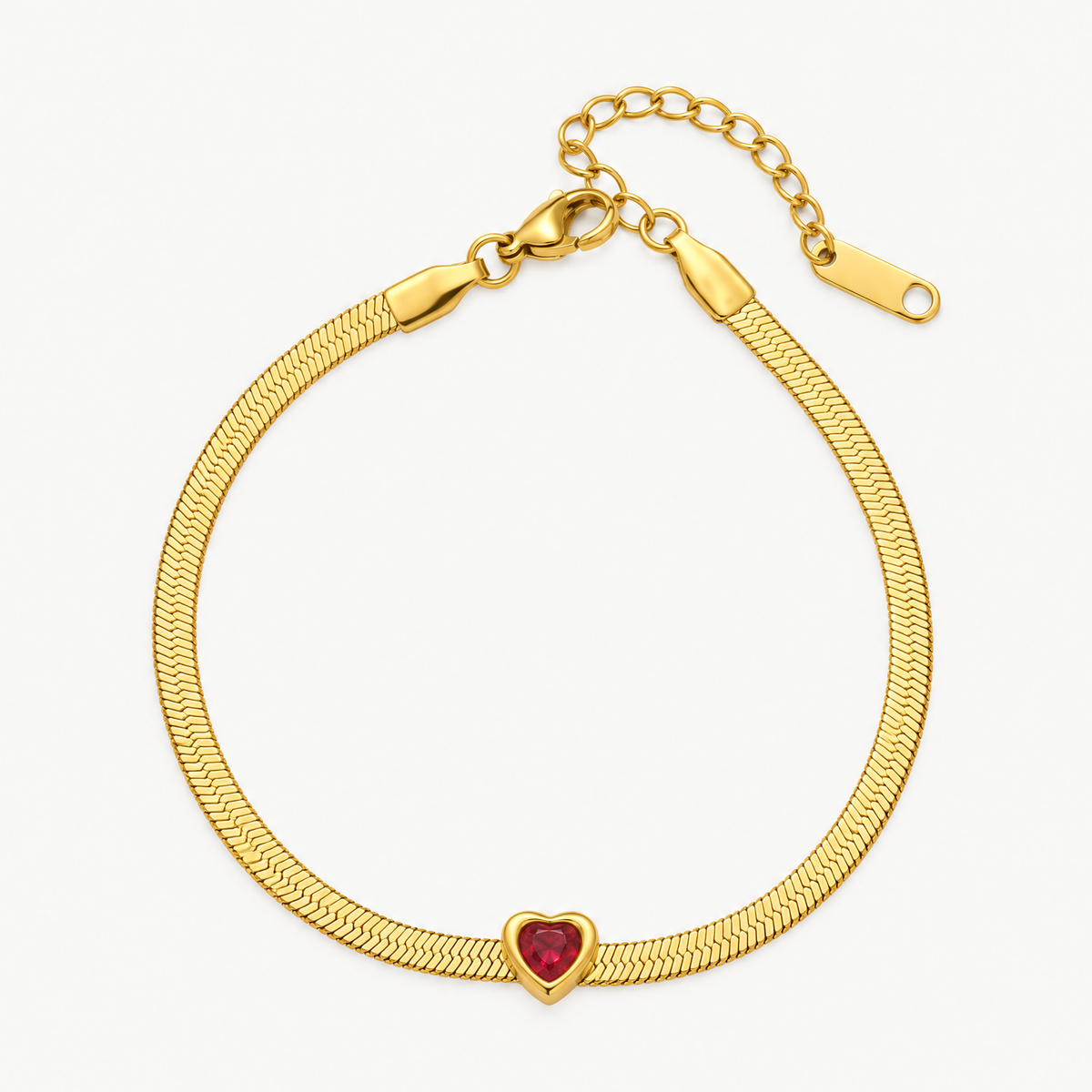 Gold-tone herringbone snake chain bracelet with a red heart birthstone
