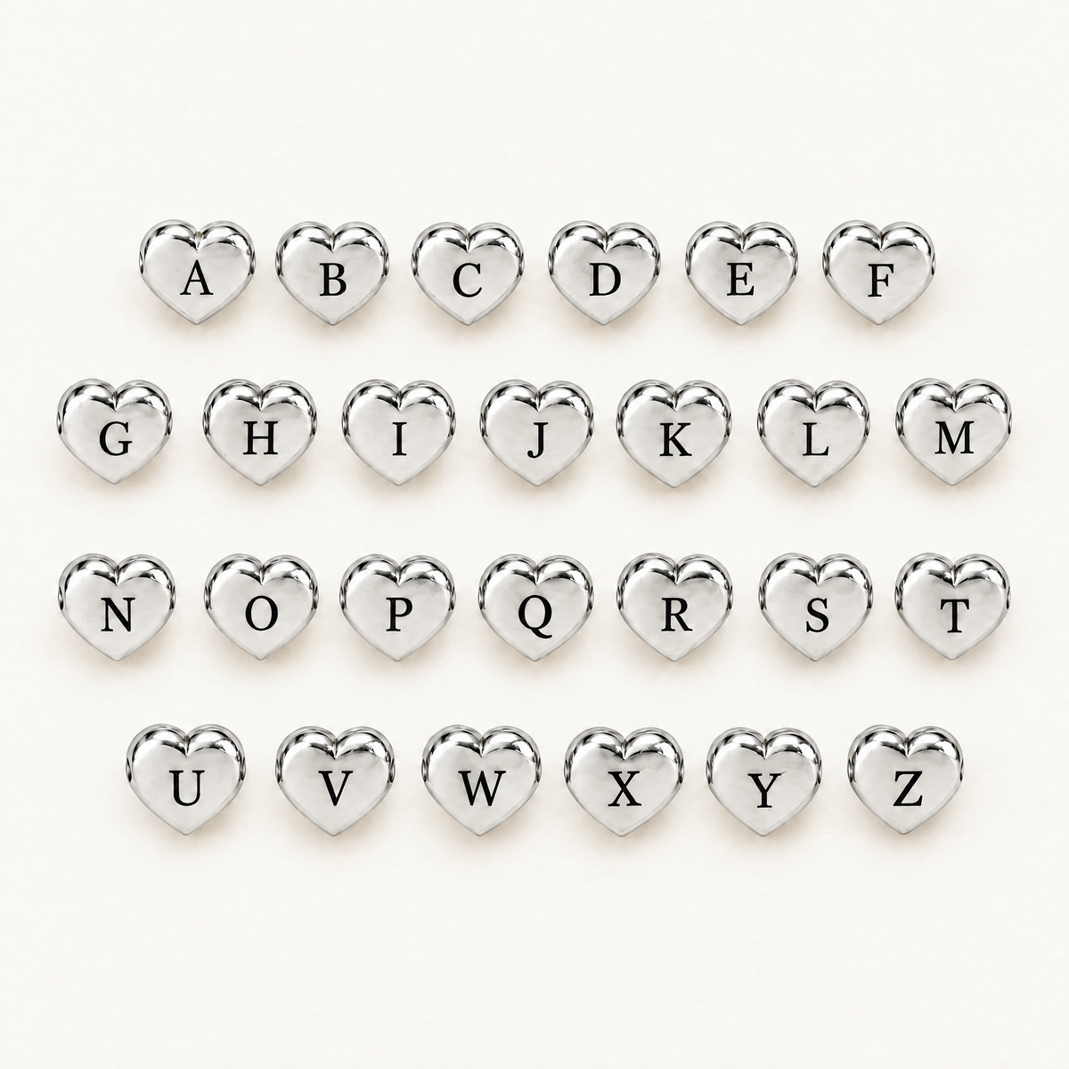 Heart charms with every letter A to Z for the silver-tone cuff bangle