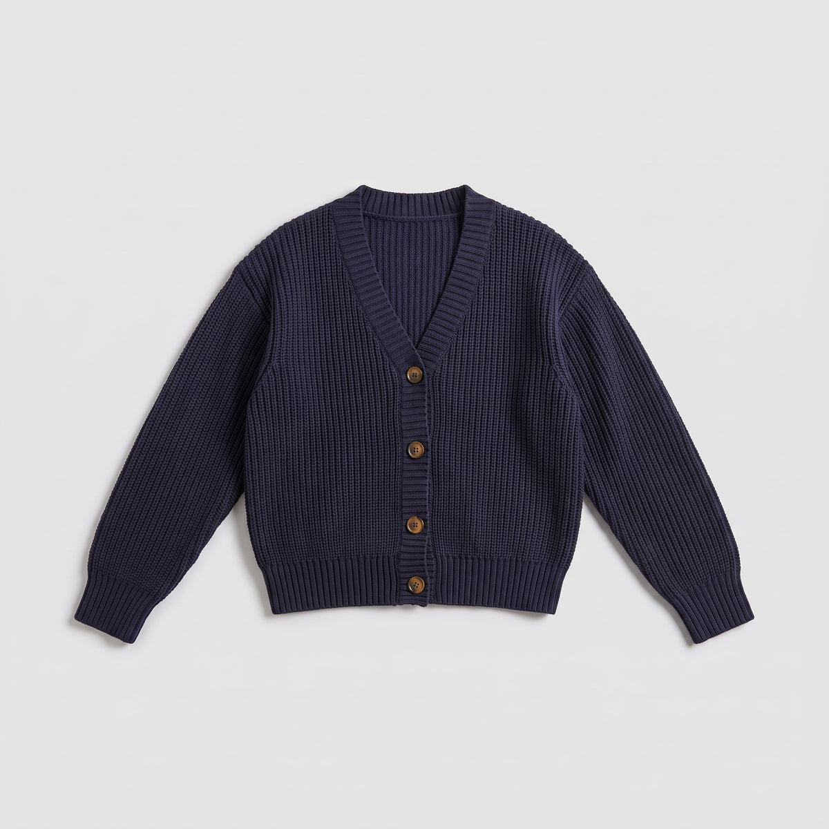 Navy chunky knit cardigan laid flat and buttoned, product shot