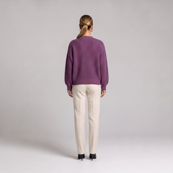 Purple chunky knit cardigan, back view on model