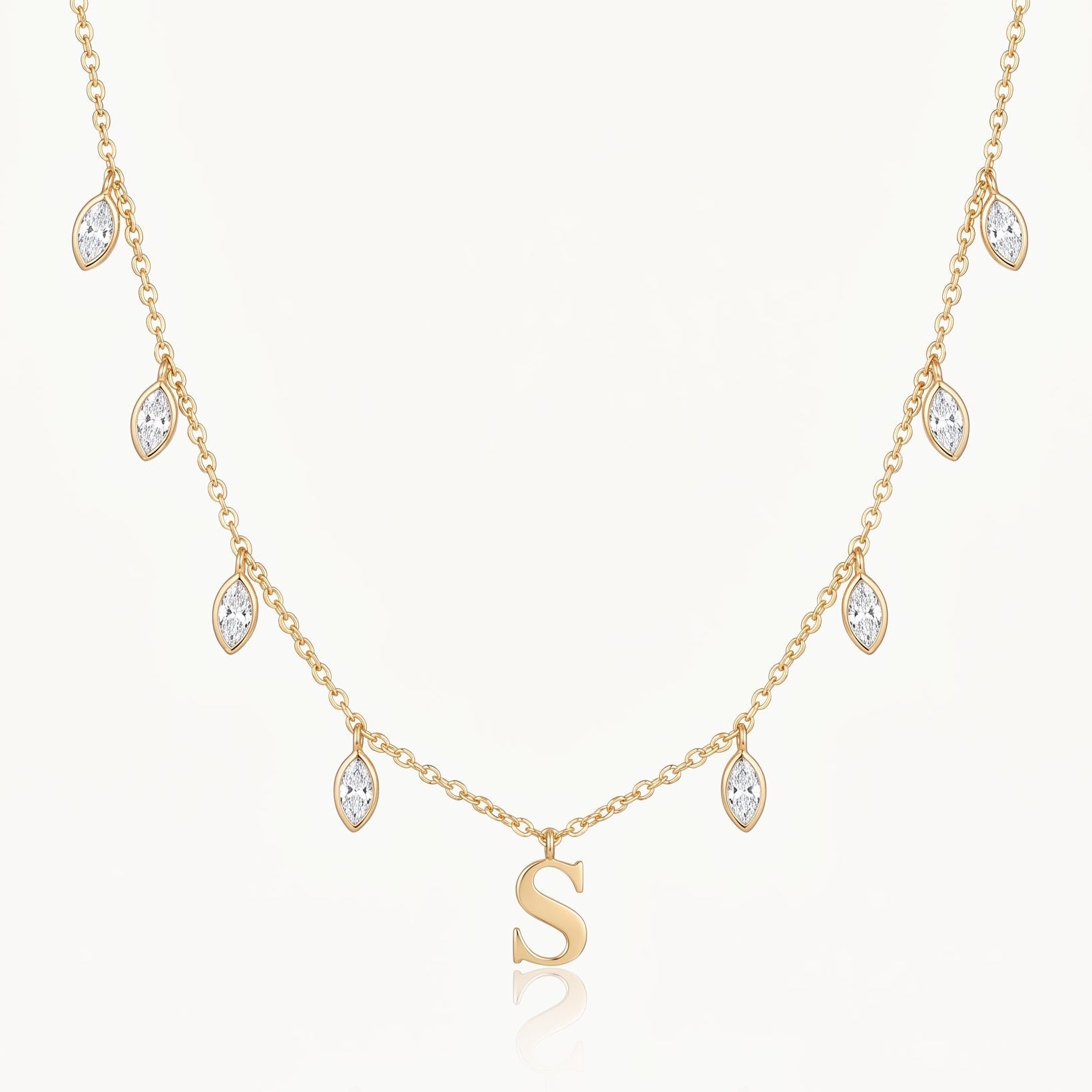 Gold-tone initial necklace with letter pendant and crystal drops