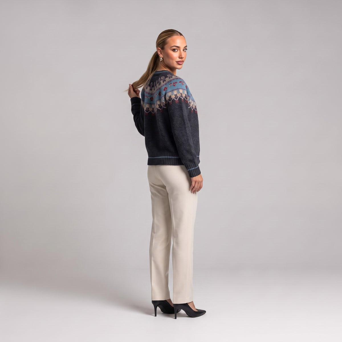 Grey Fair Isle Christmas cardigan, three quarter view on model