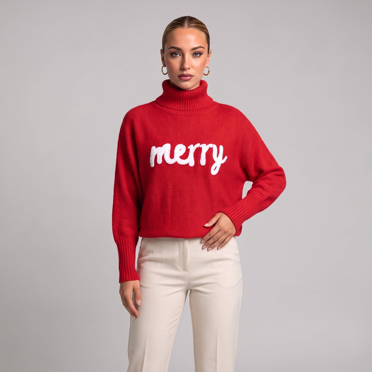 Close-up of red merry roll neck Christmas jumper on model