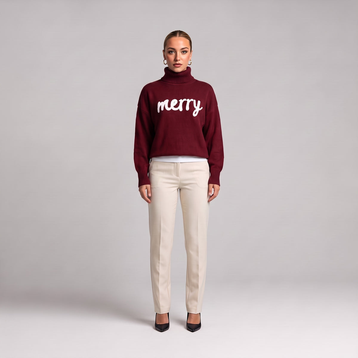 Burgundy merry roll neck Christmas jumper, front view on model