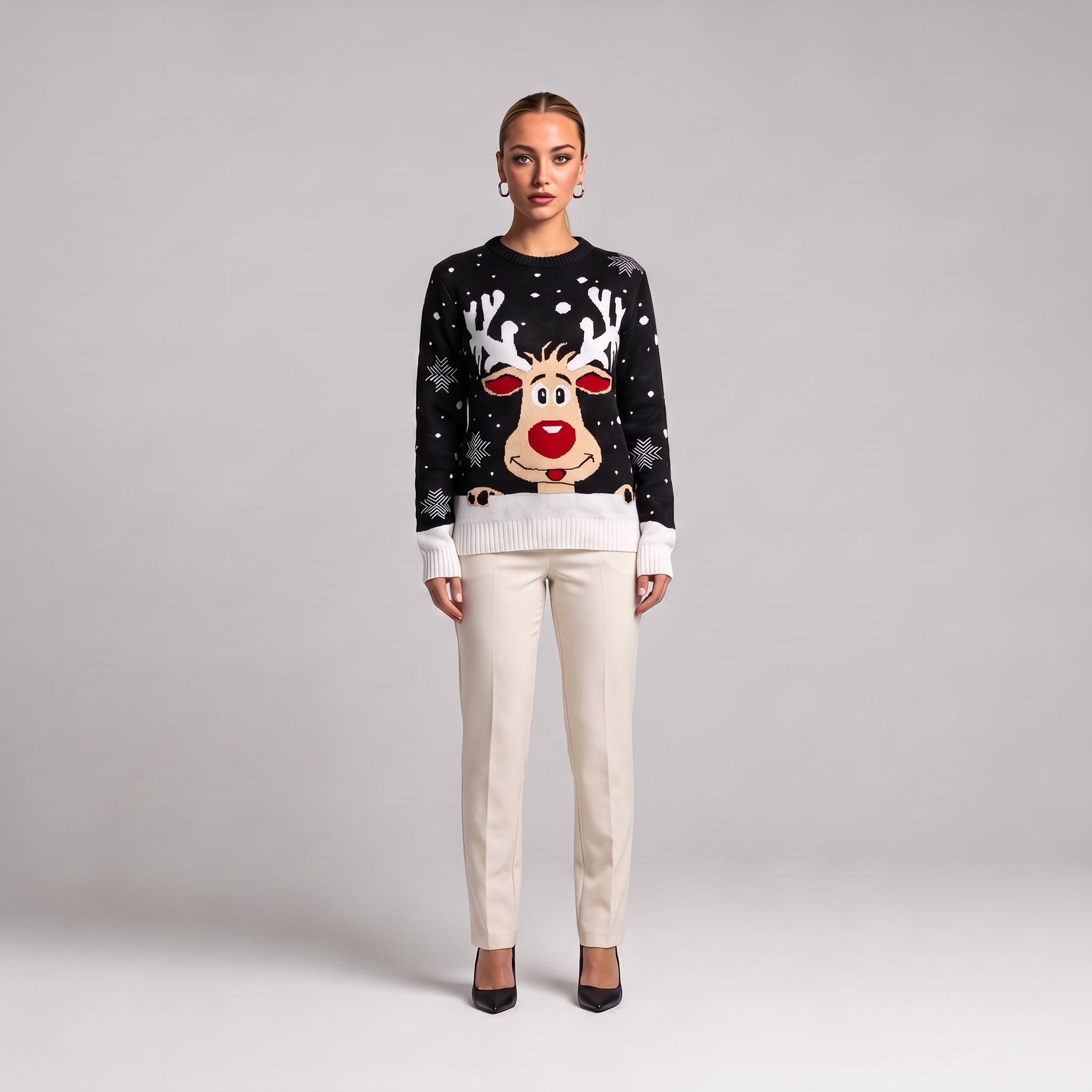 Black reindeer face Christmas jumper, front view on model