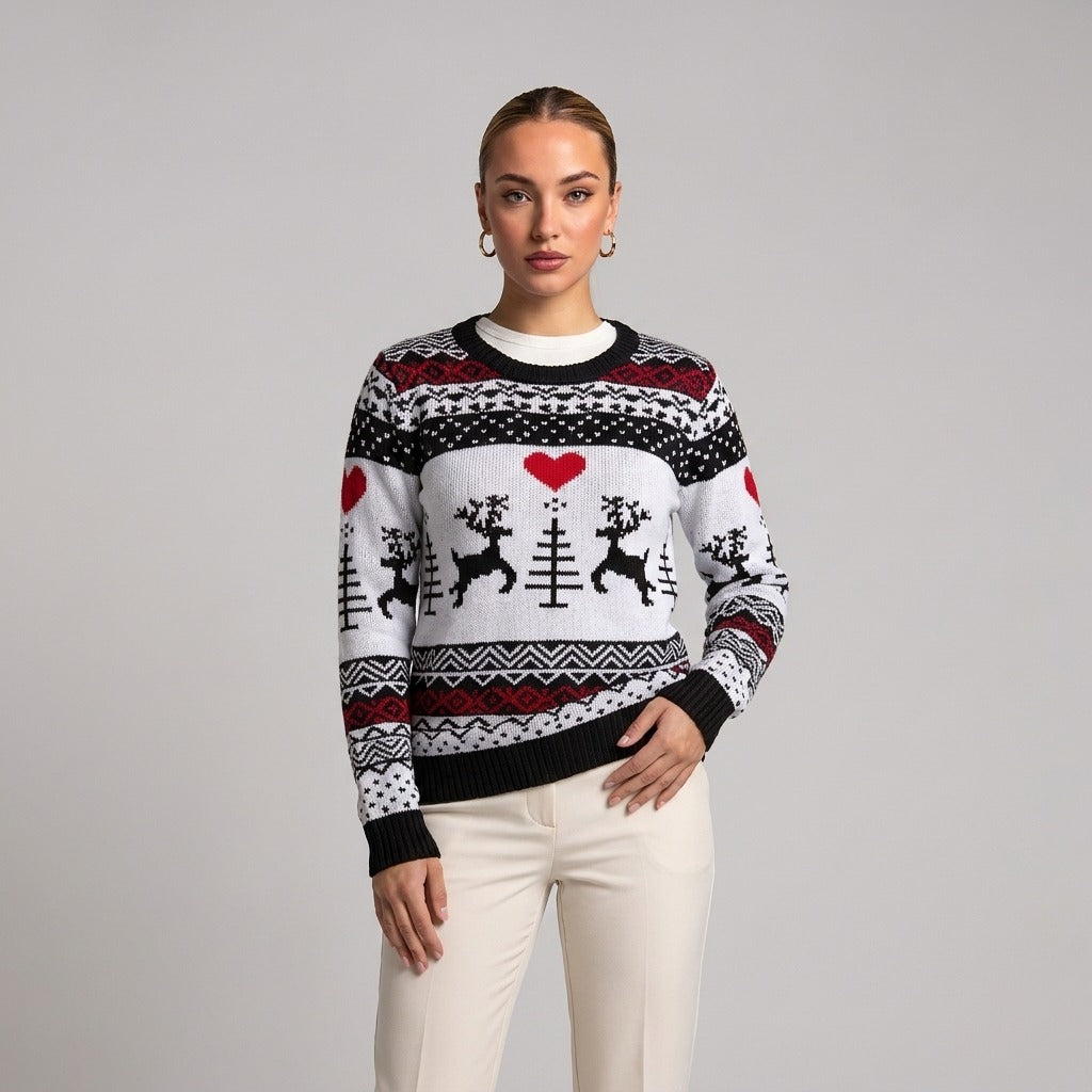 Close-up of white Fair Isle Christmas jumper with hearts and reindeer on model