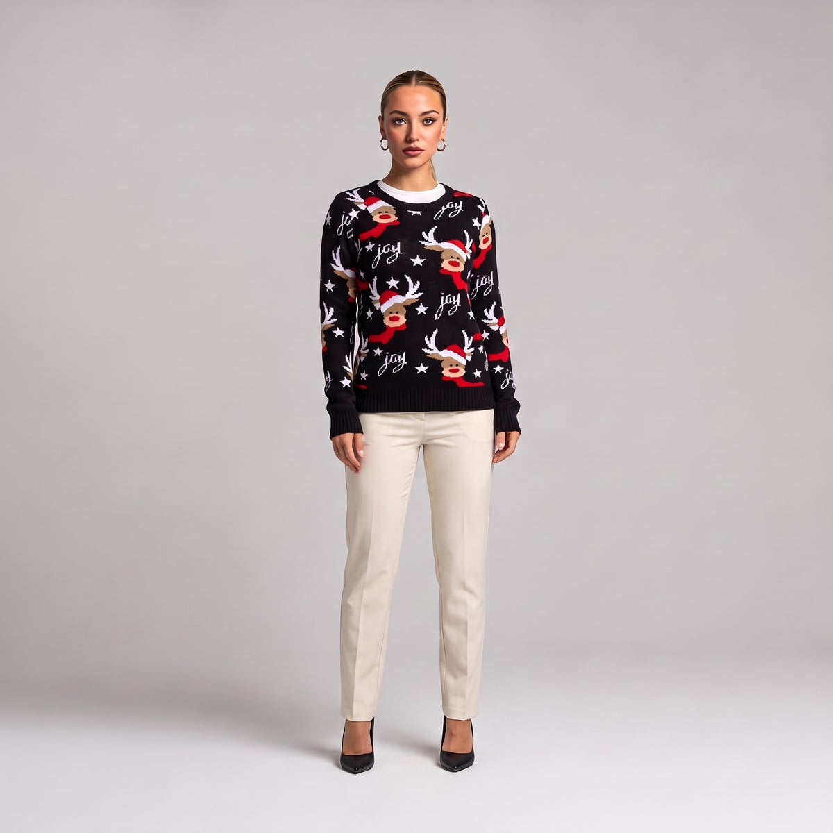 Black joy reindeer Christmas jumper, front view on model