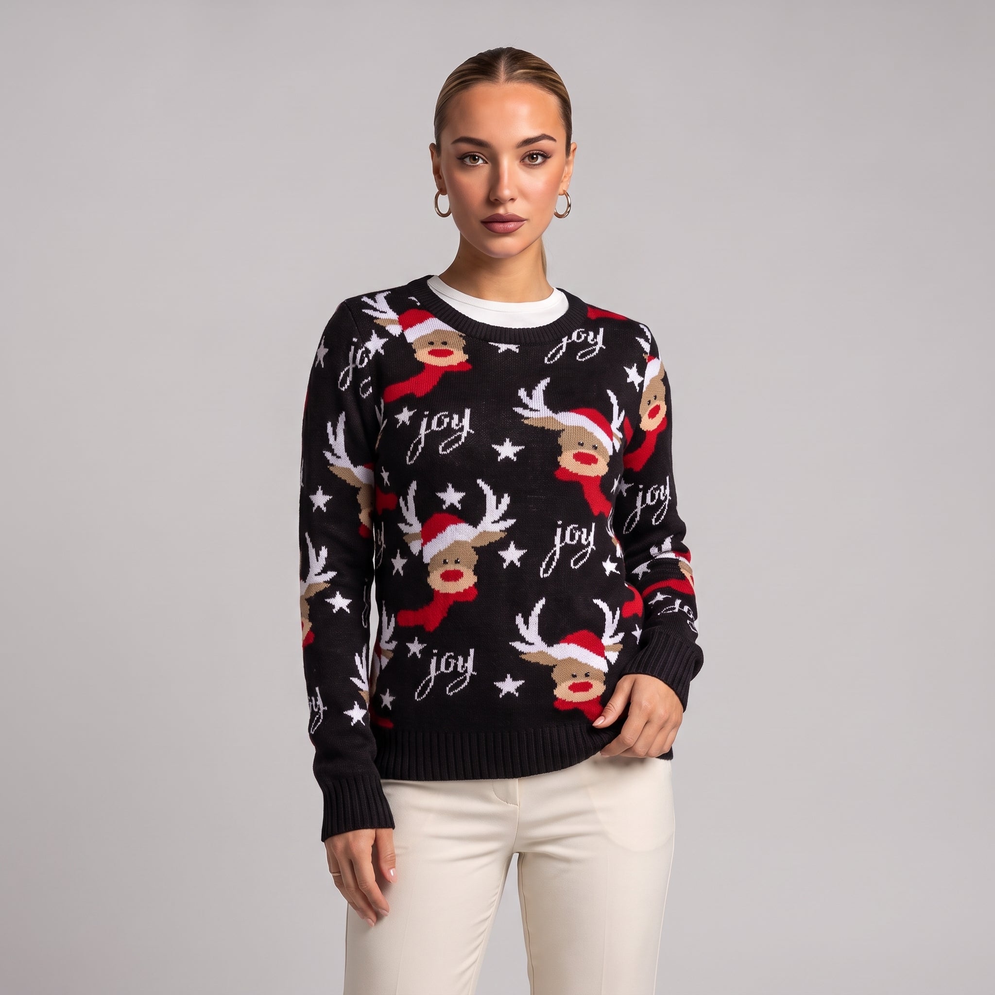 Close-up of black joy reindeer Christmas jumper on model