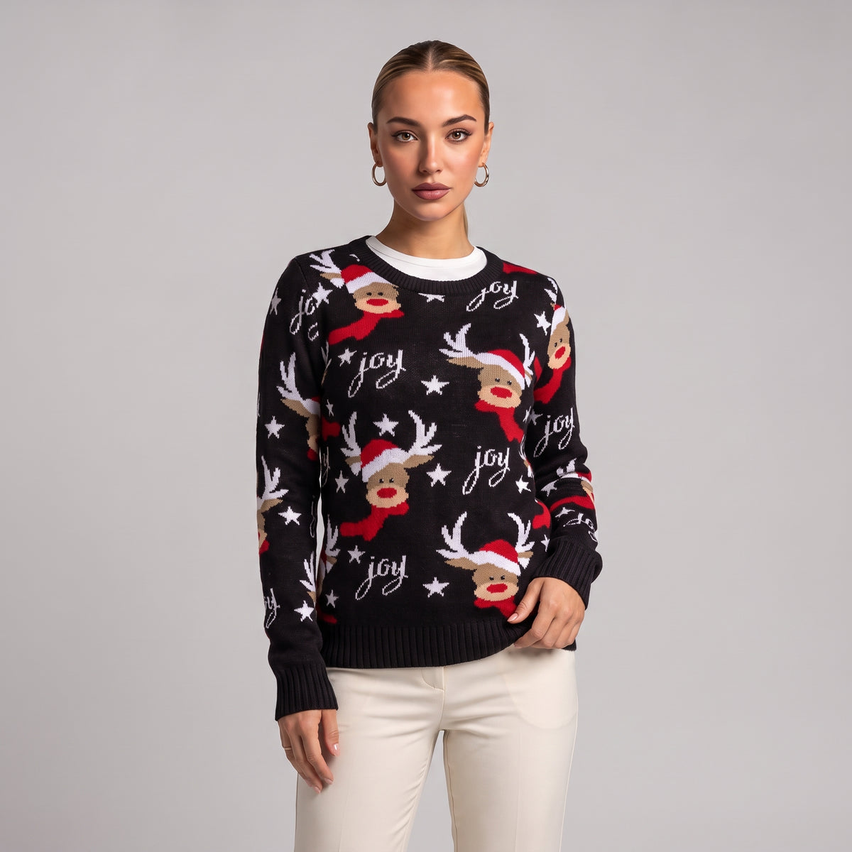 Close-up of black joy reindeer Christmas jumper on model