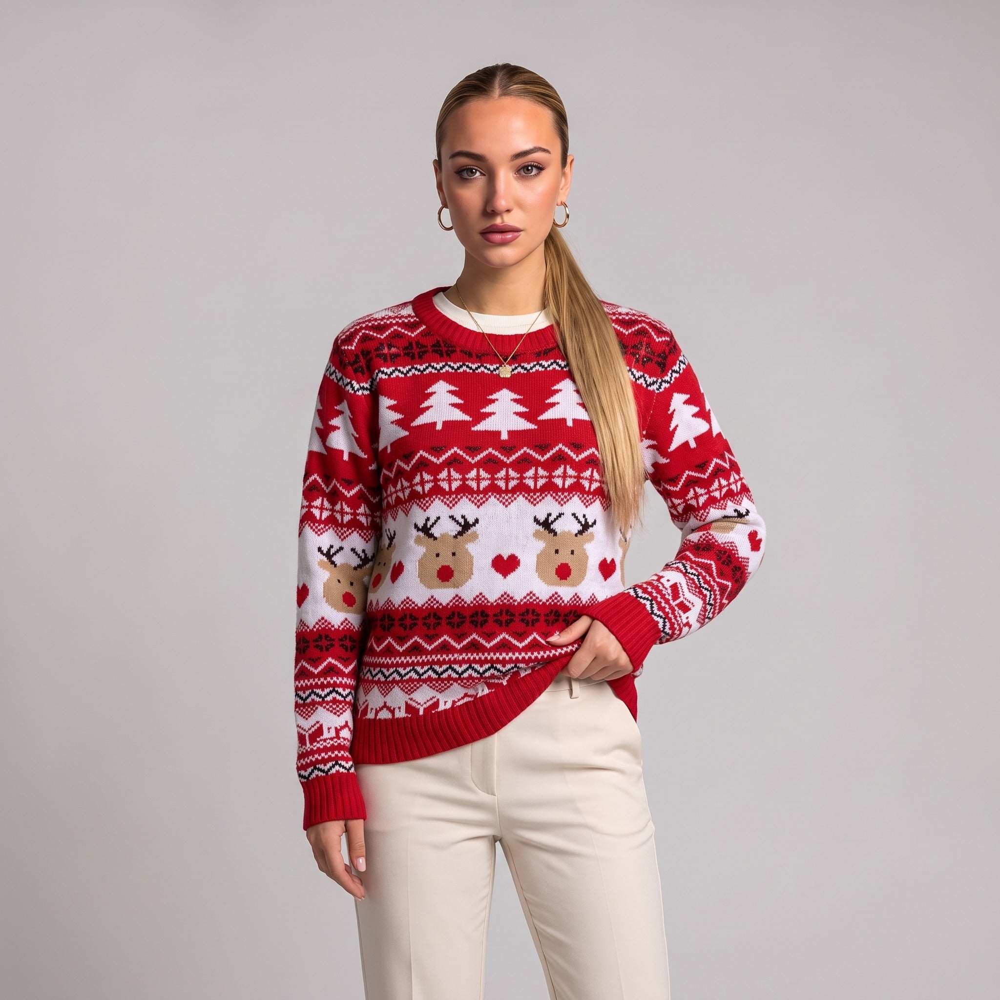 Close-up of red Fair Isle reindeer Christmas jumper on model