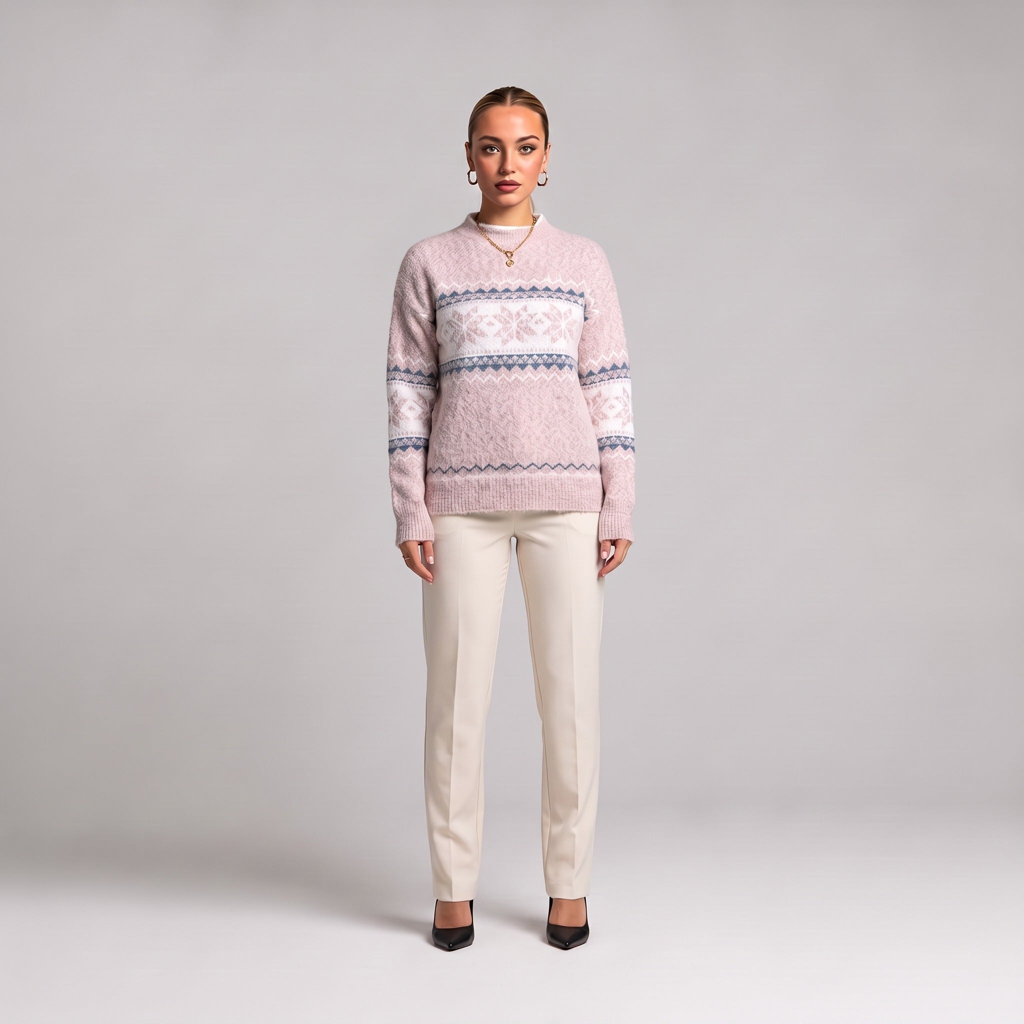 Baby pink snowflake chenille Christmas jumper, front view on model