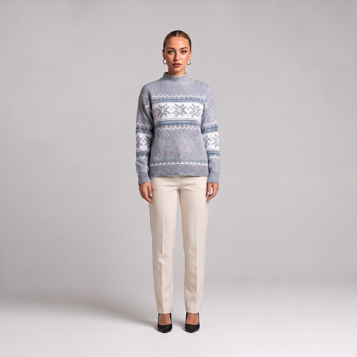 Grey snowflake chenille Christmas jumper, front view on model