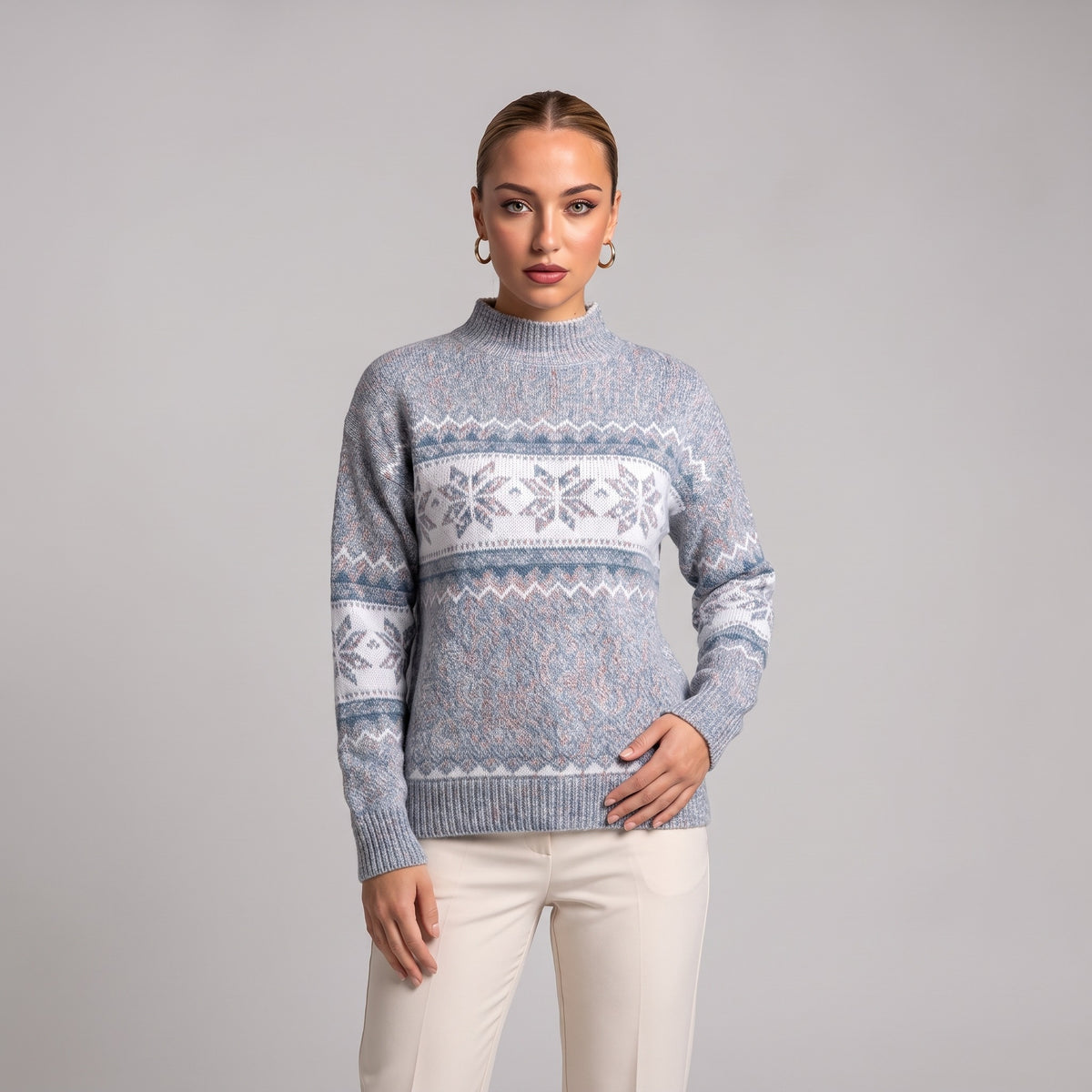 Close-up of grey snowflake chenille Christmas jumper on model