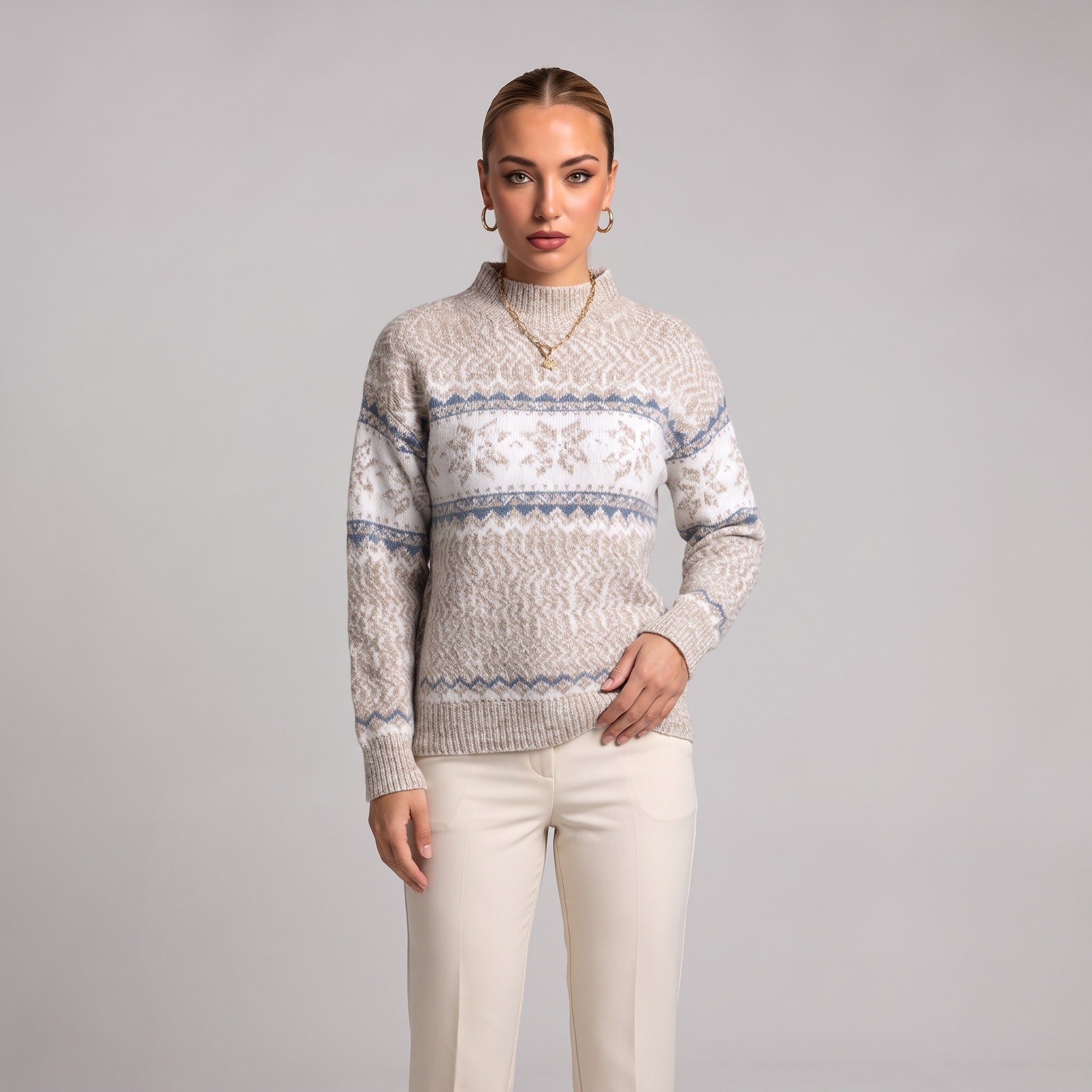 Close-up of beige snowflake chenille Christmas jumper on model