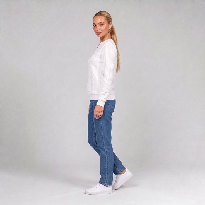 White quarter zip cable knit jumper, side view on model