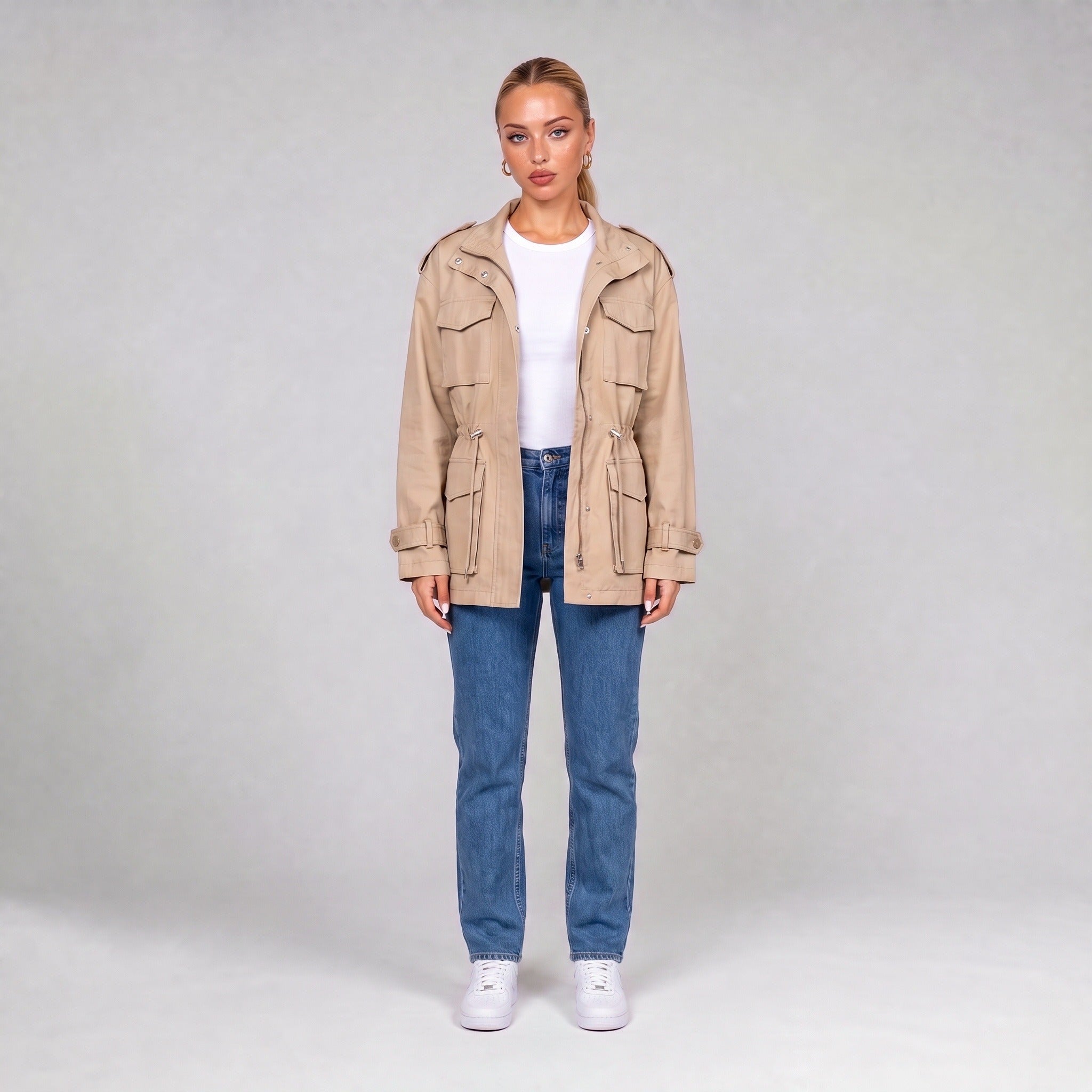 Cream utility jacket, front view on model with jeans