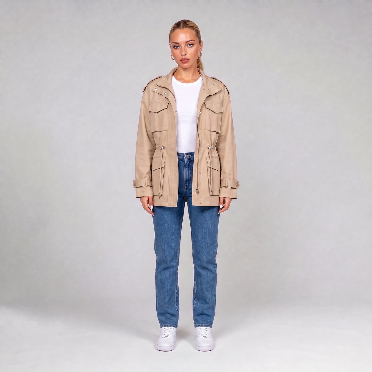 Cream utility jacket, front view on model with jeans