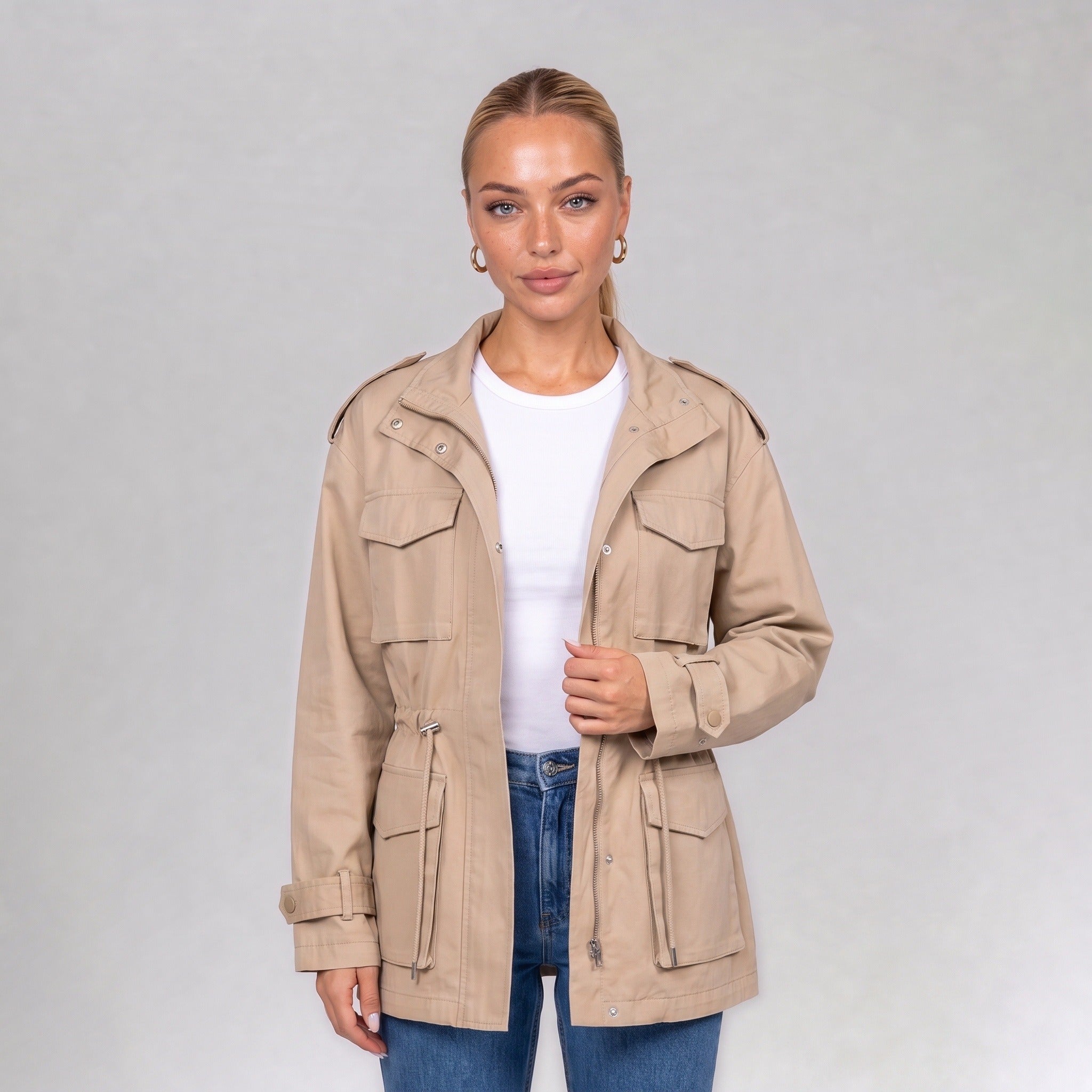 Close up of the cream utility jacket collar and chest pockets