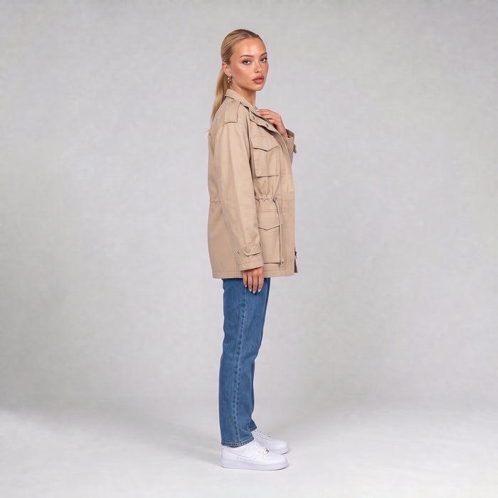 Cream utility jacket, side view on model