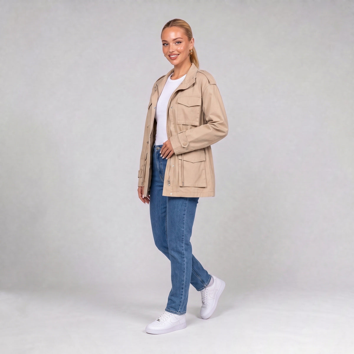 Cream utility jacket, three quarter view on model