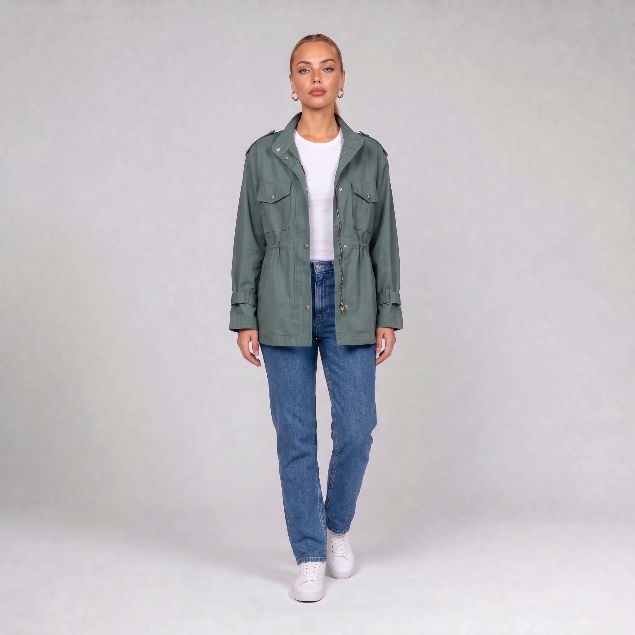 Green utility jacket, front view on model with jeans