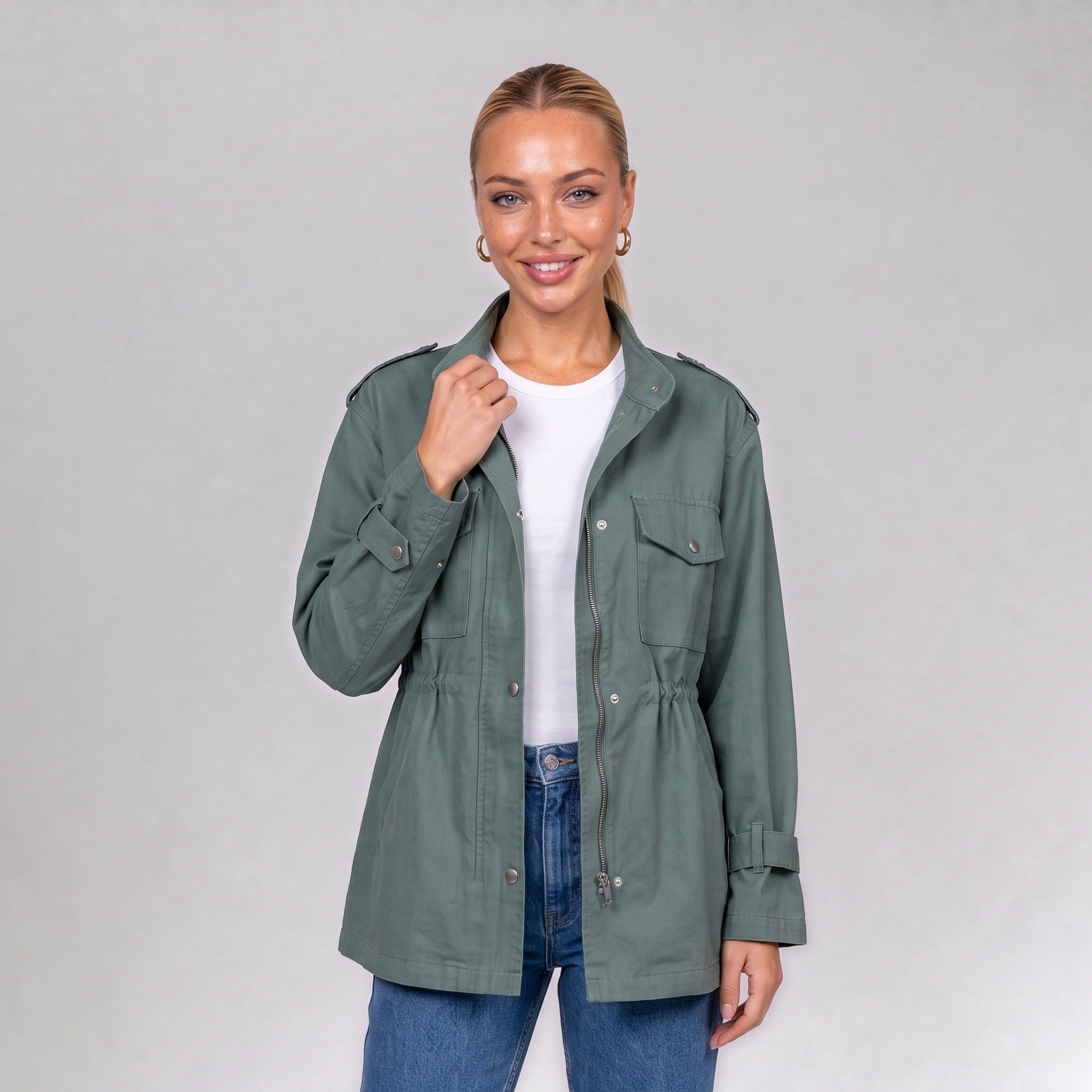 Green utility jacket, close up of chest pockets on model