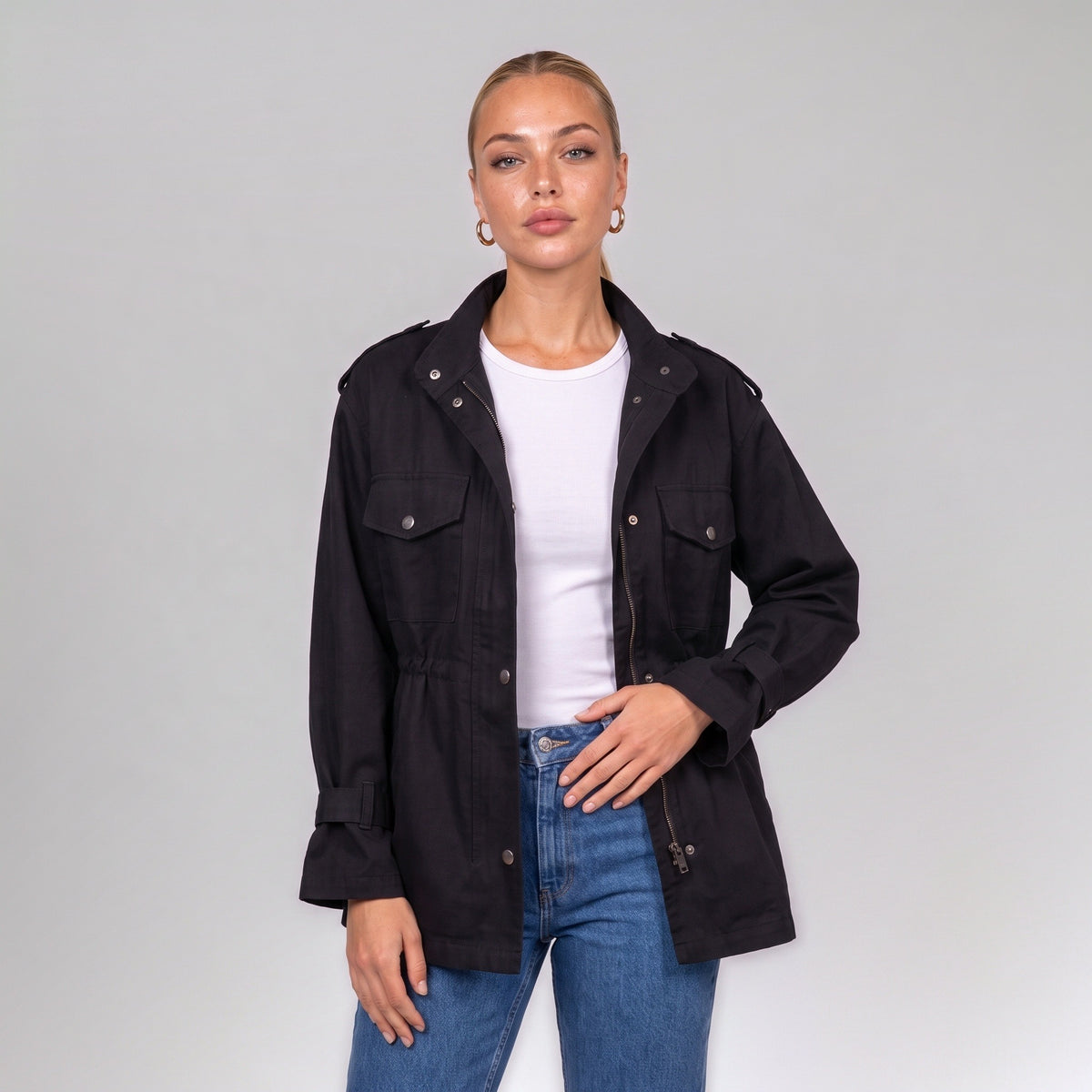Close up of the black utility jacket collar and chest pockets