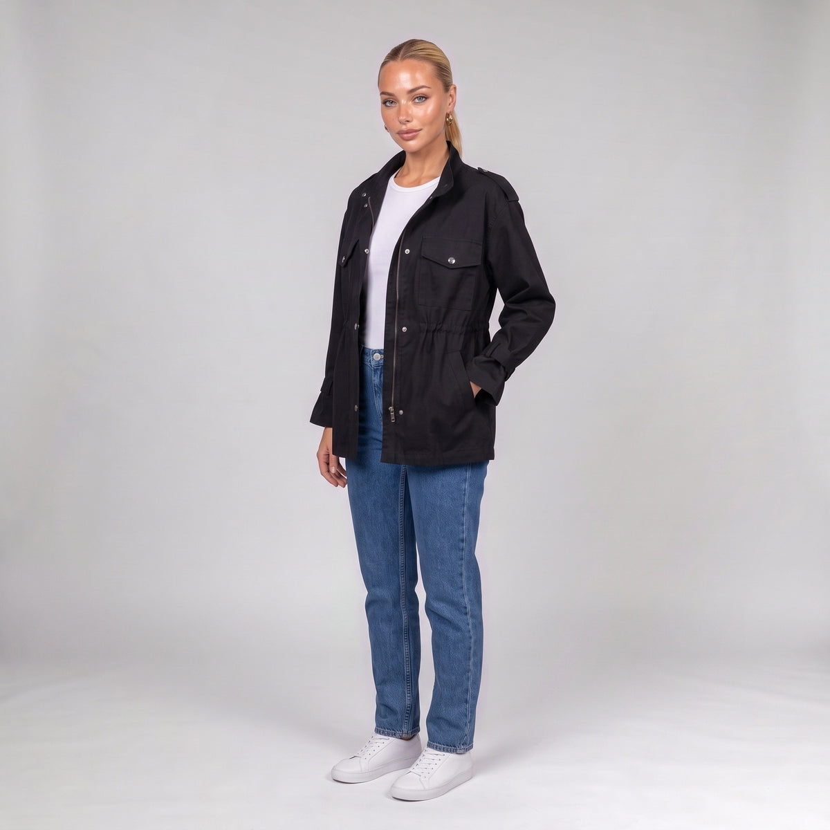 Black utility jacket, three quarter view on model