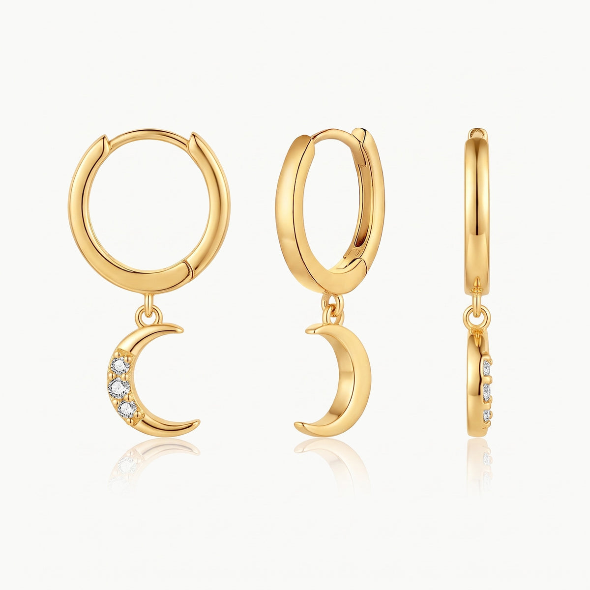 Gold-tone huggie earring with charm, shown from three angles