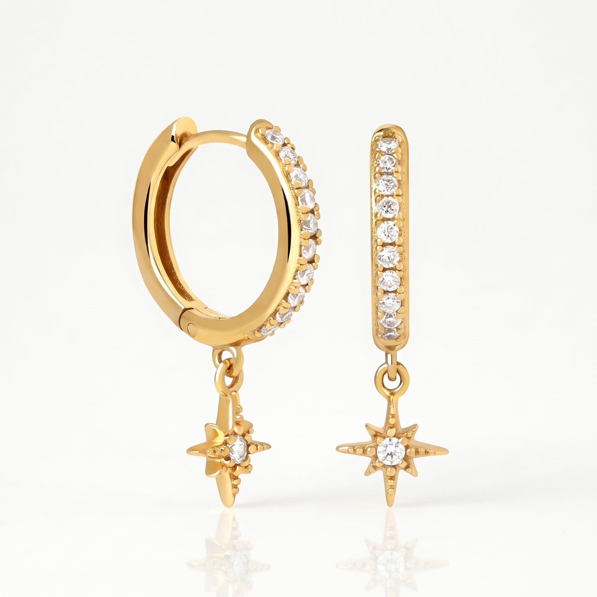 Gold-tone star charm huggie hoop earrings