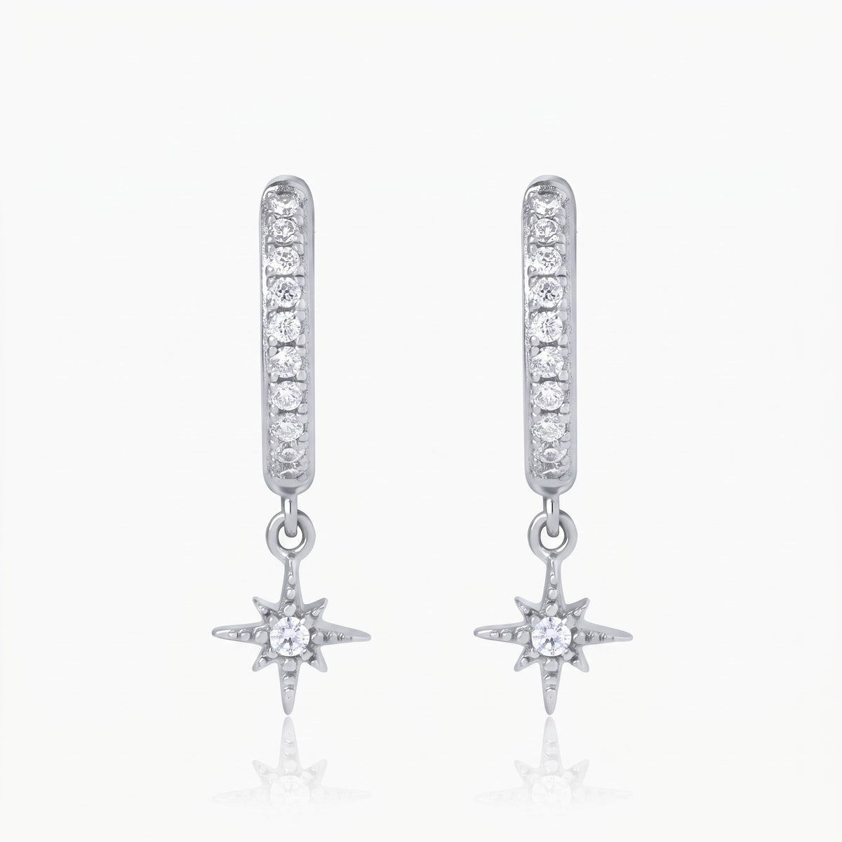 Silver-tone star charm huggie hoop earrings