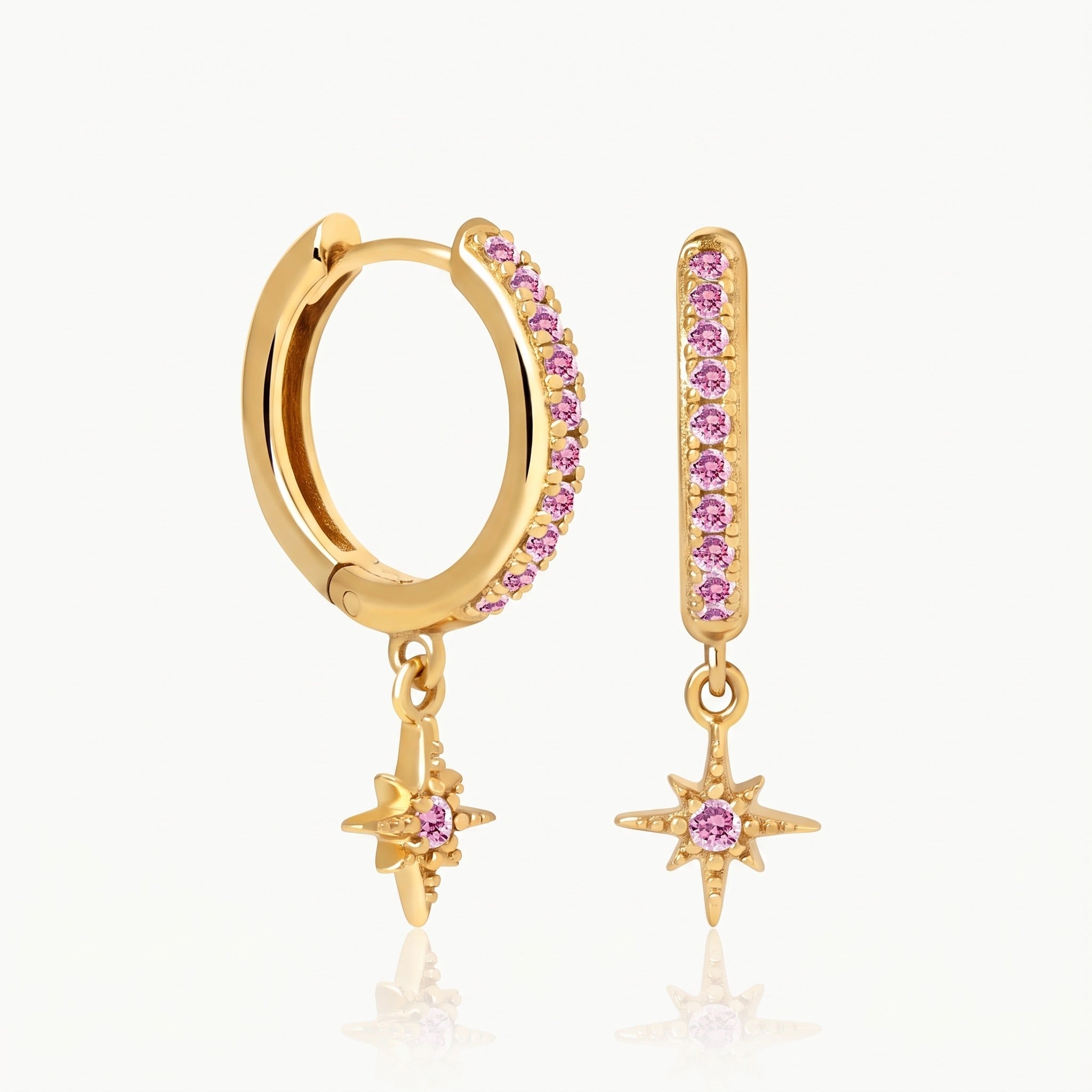 Gold-tone star charm huggie hoop earrings with pink crystals
