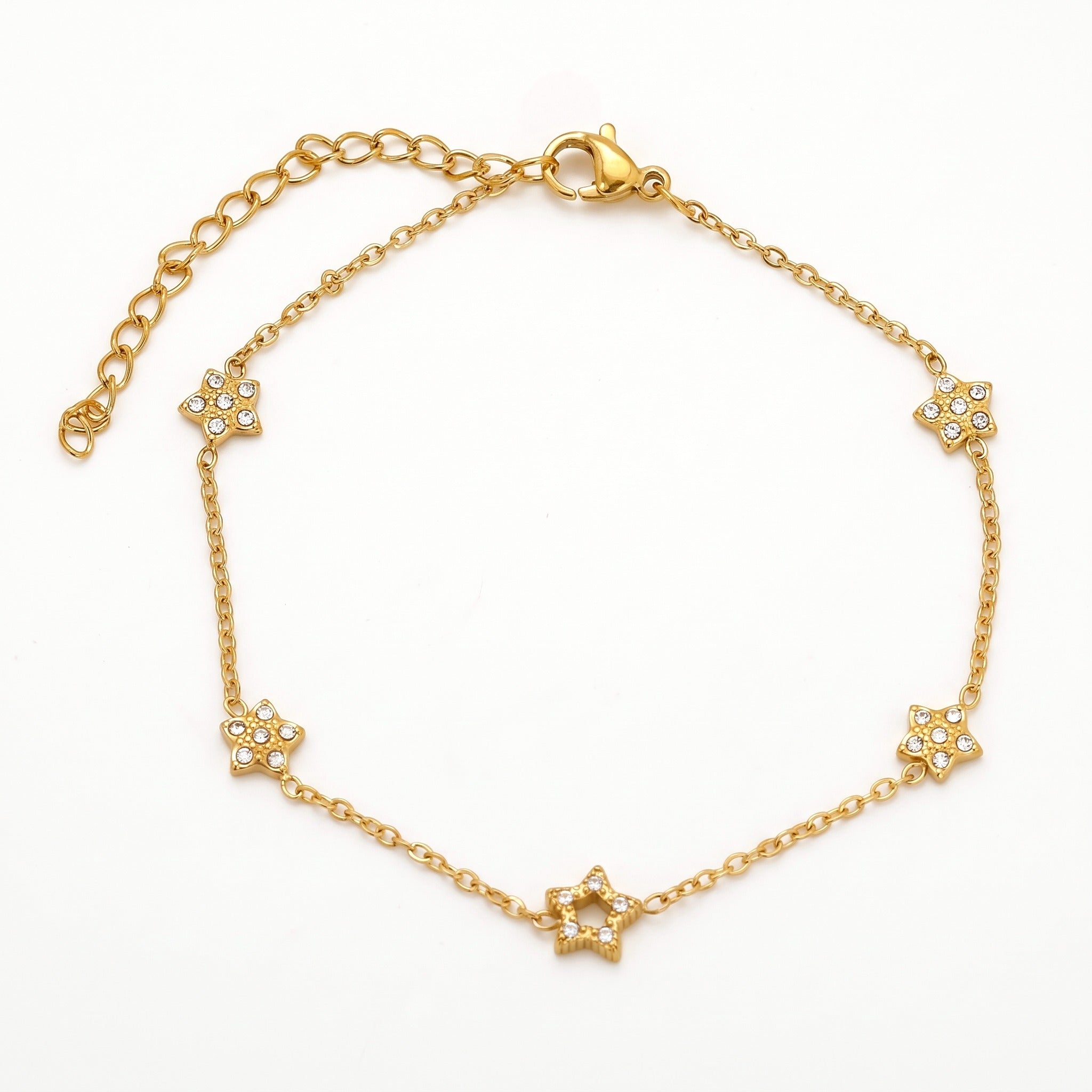 Gold-tone star charm bracelet with crystal stars