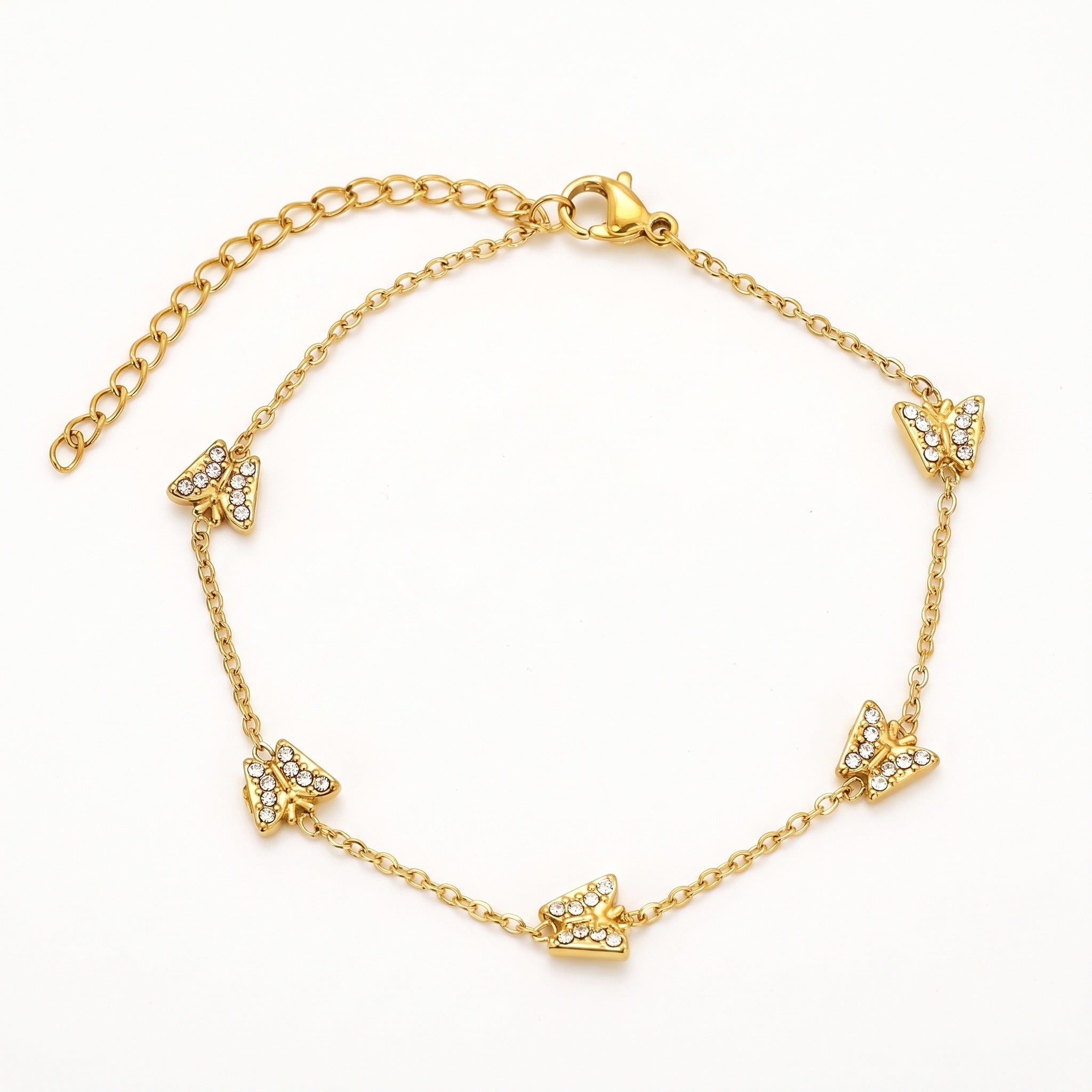 Gold-tone butterfly charm bracelet with crystals
