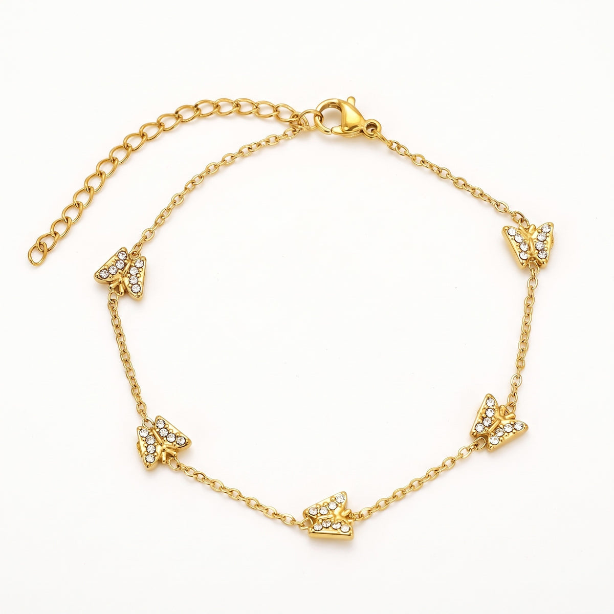 Gold-tone butterfly charm bracelet with crystals
