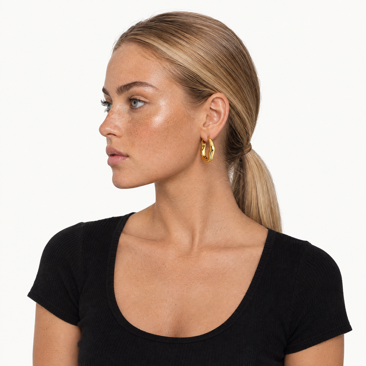 Gold-tone chunky wavy hoop earrings