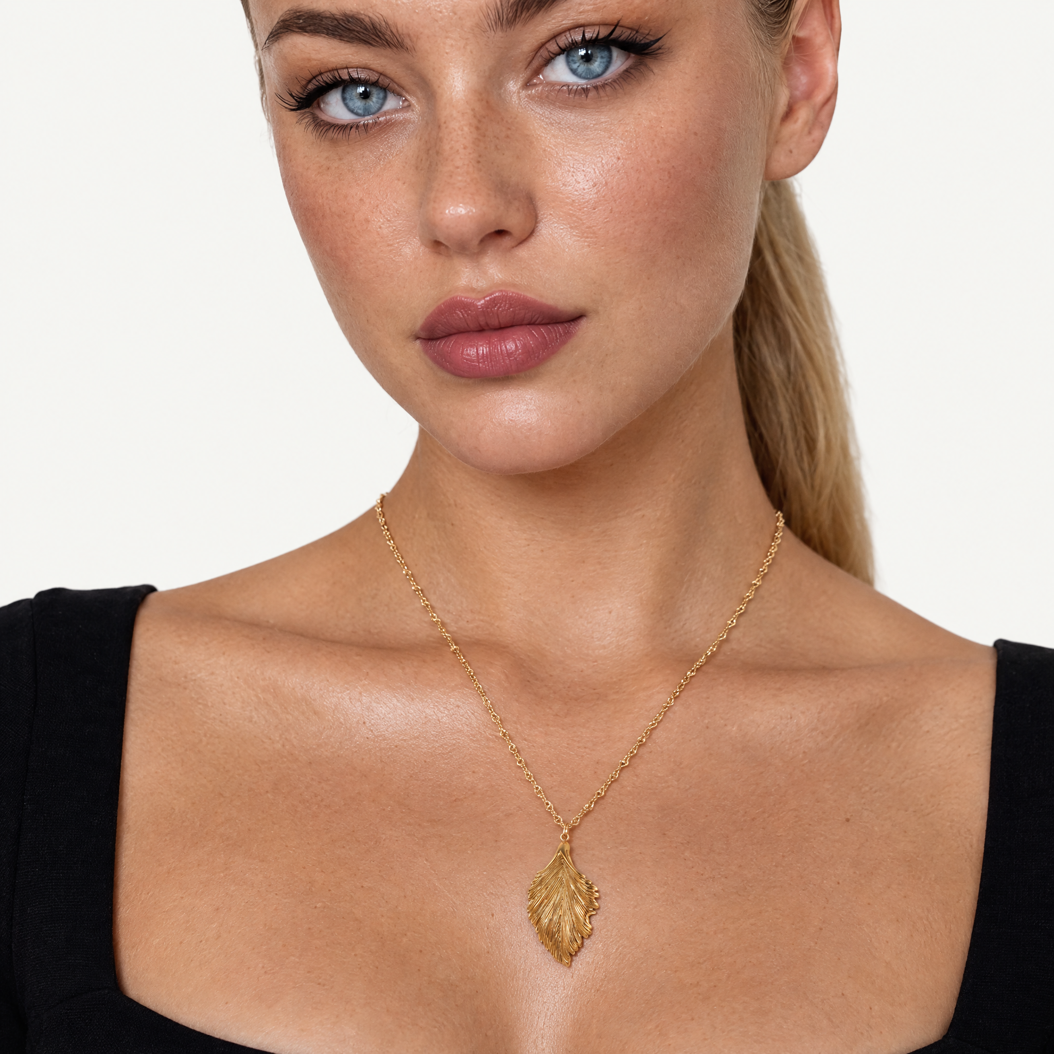 Gold-tone leaf pendant necklace
