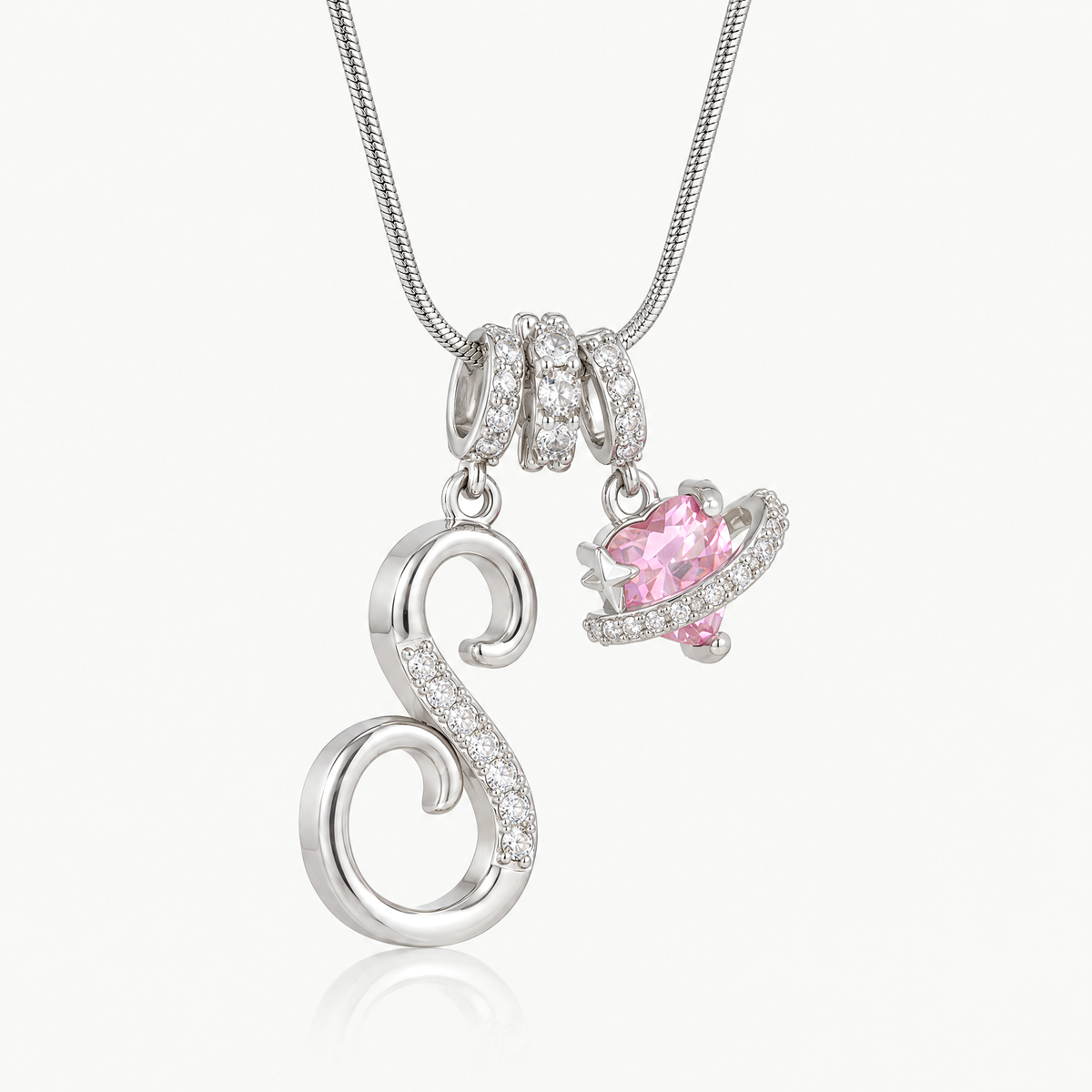 Silver-tone script initial necklace with pink flower charm