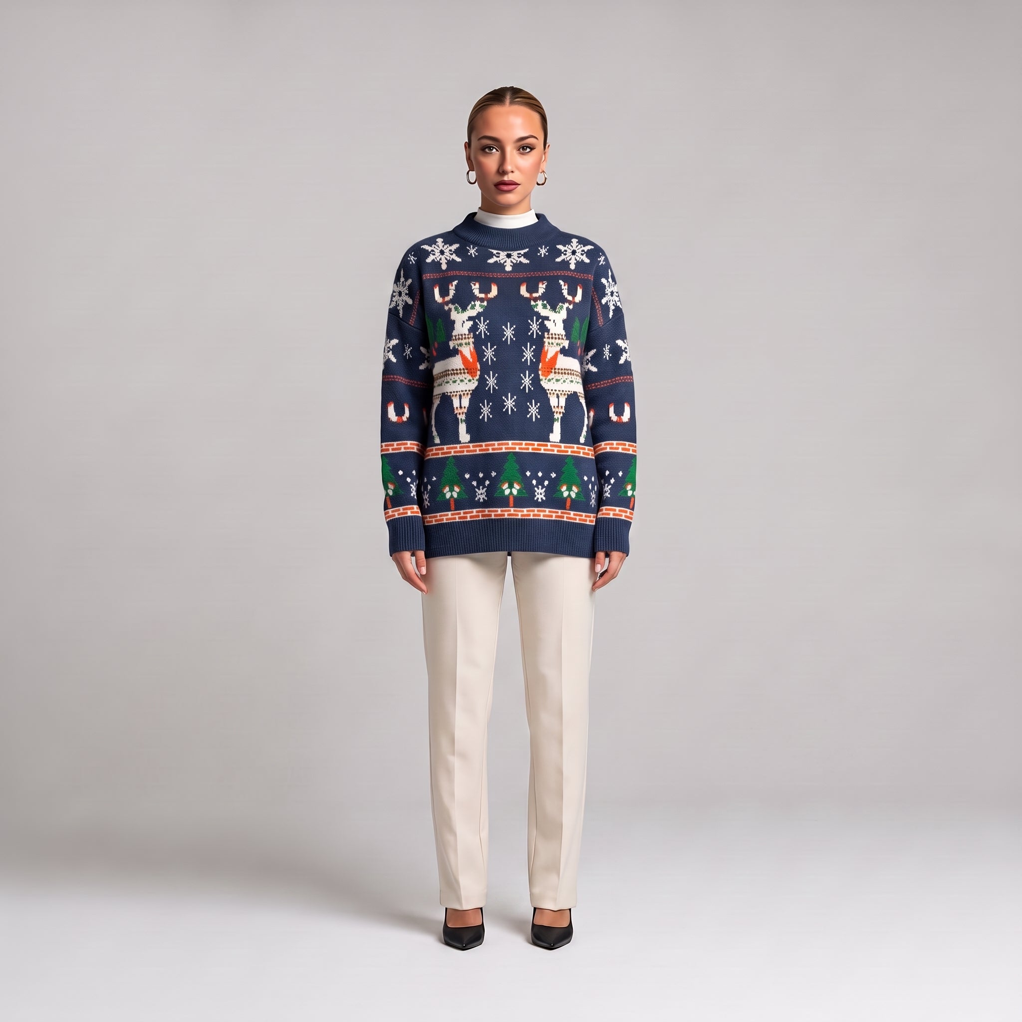 Navy blue oversized reindeer Christmas jumper, front view on model
