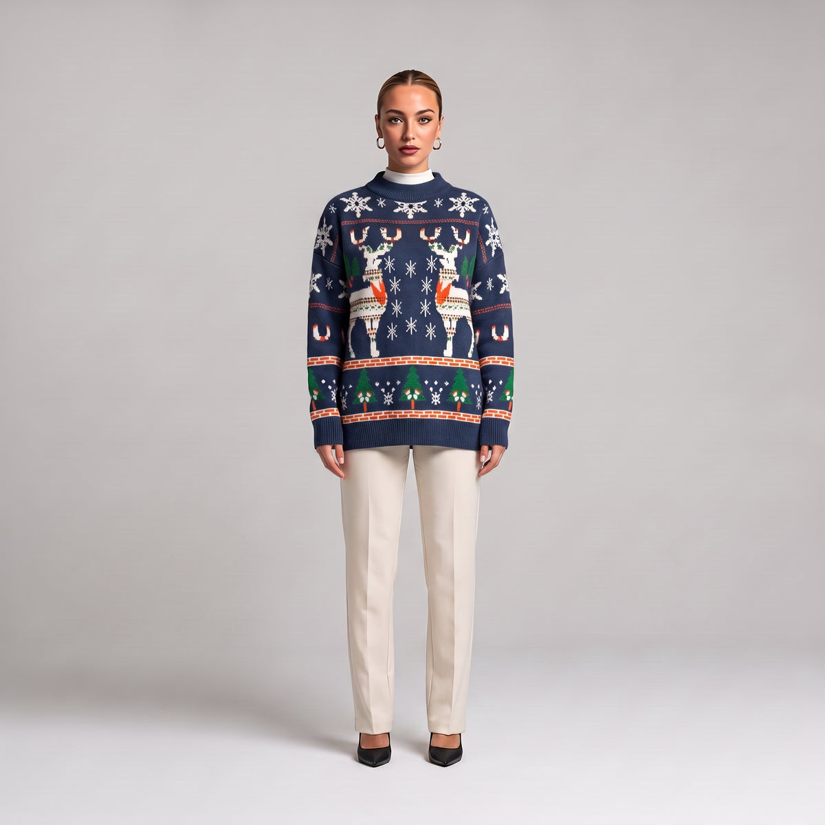 Navy blue oversized reindeer Christmas jumper, front view on model