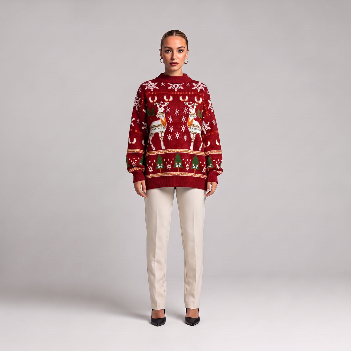 Red oversized reindeer Christmas jumper, front view on model
