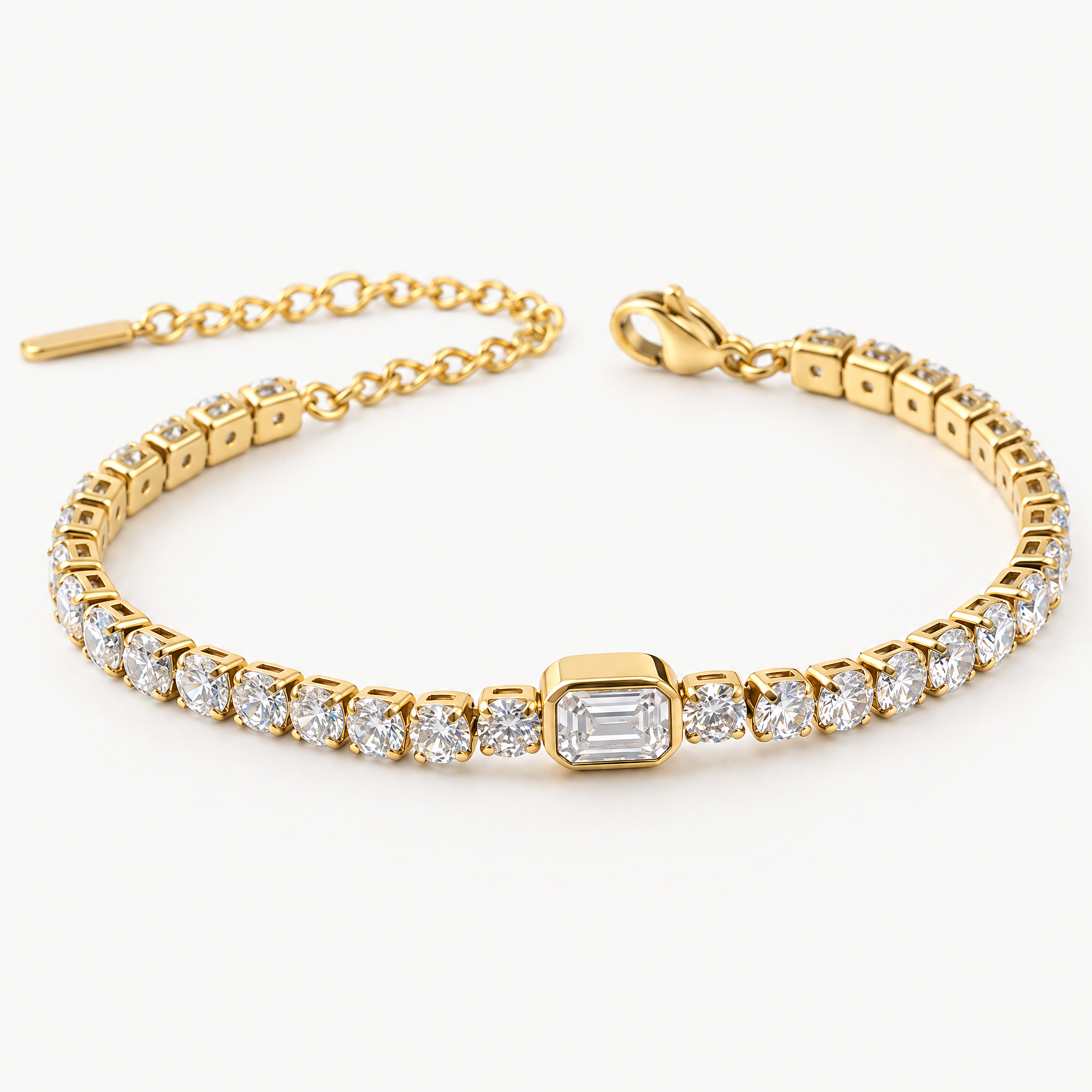 Gold-tone tennis bracelet with an emerald-cut centre stone, angled view