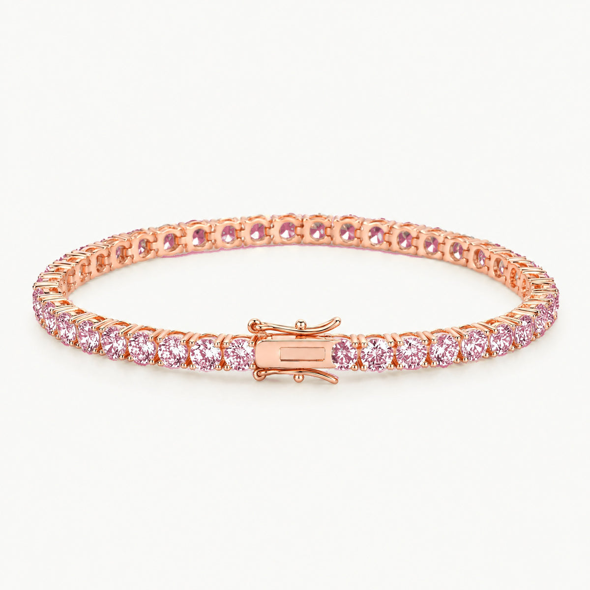 Rose gold plated 3mm tennis bracelet with pink stones, angled view
