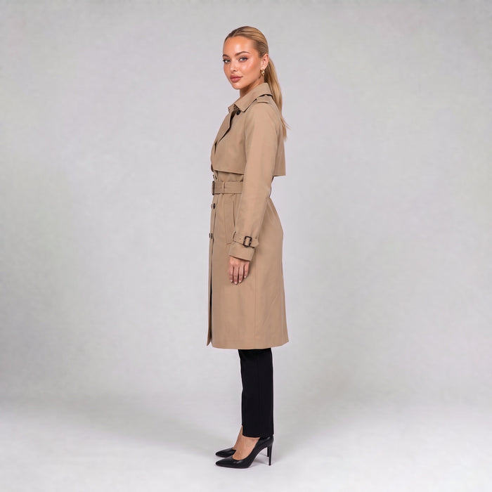 Khaki double breasted trench coat with belt, side view on model